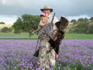 A happy and Husband and Wife Turkey Hunting in Texas